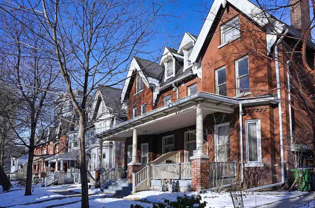 Semi-detached house construction in Ledbury Park, Toronto with brick exterior