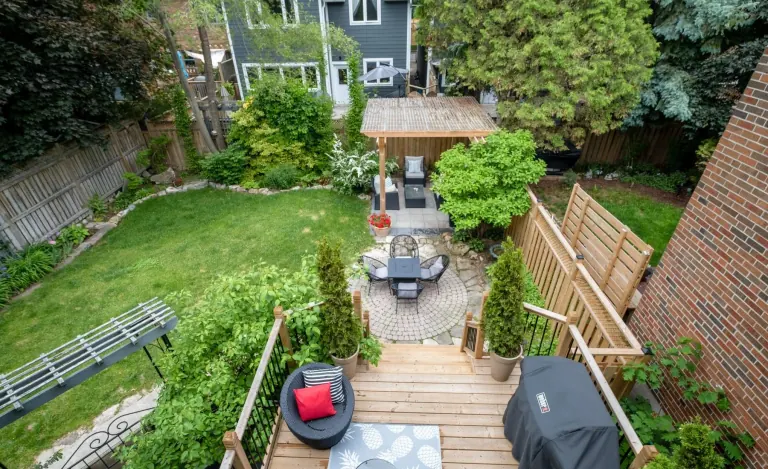 Finished rear deck and garden seen from inside the house